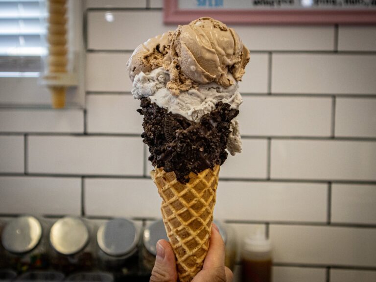 Freshly made waffle cone with three homemade ice cream scoops